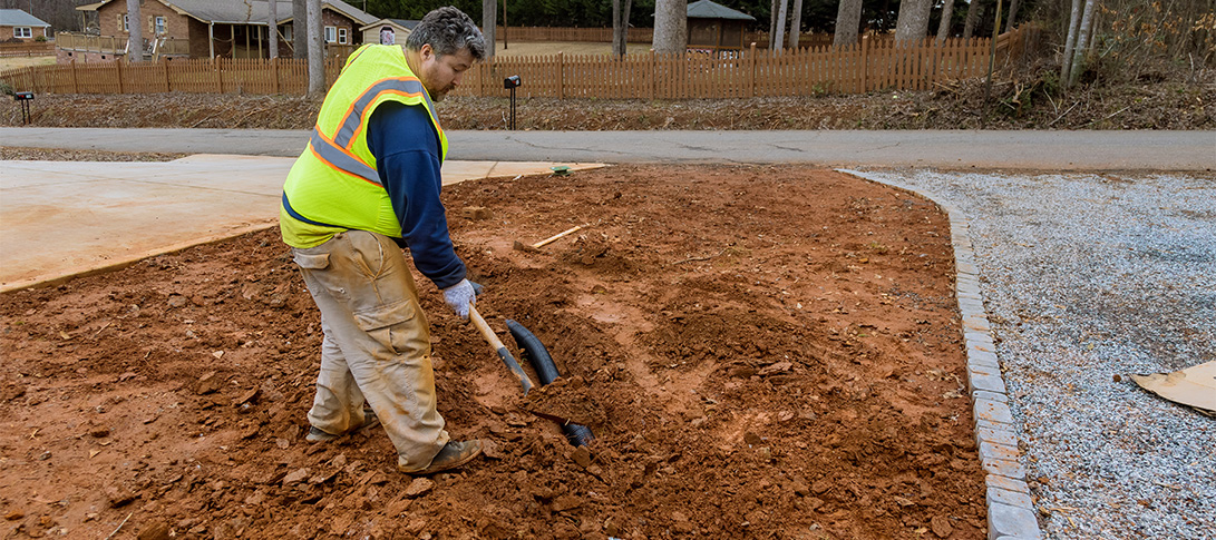 photo: a technician performs structural repairs to a watershed