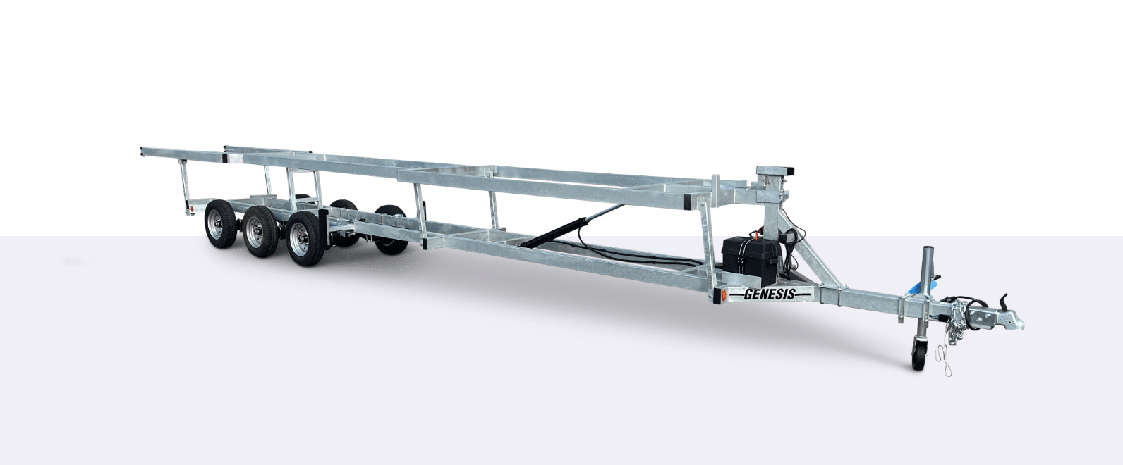 Triple-axle aluminum boat trailer with winch, Genesis branding, and extended frame, shown on a plain white background.