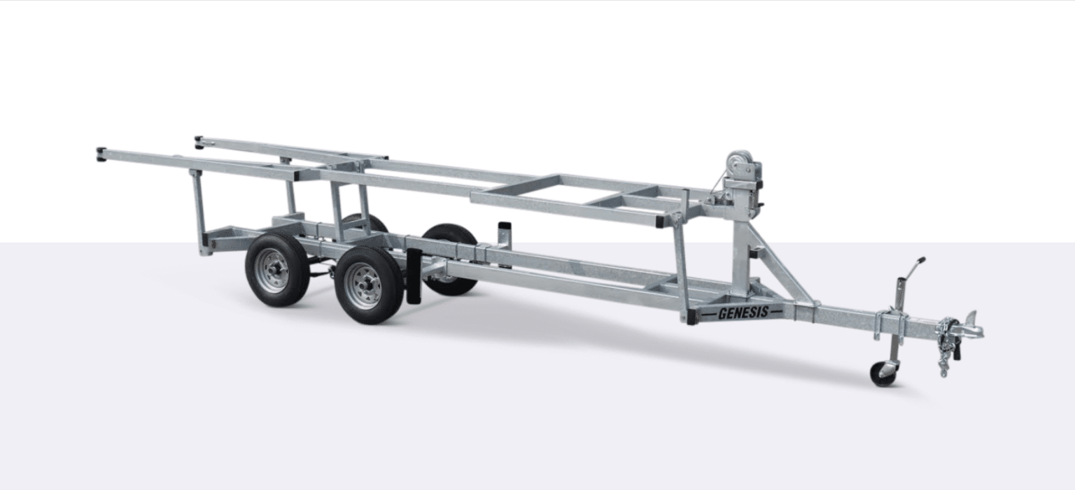 Metal boat trailer with dual axles, winch, and adjustable supports, designed for transporting boats; Genesis branding visible on the frame.